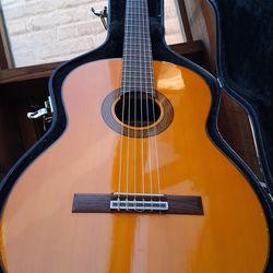Takamine G128S Classical Guitar w/ hard case.