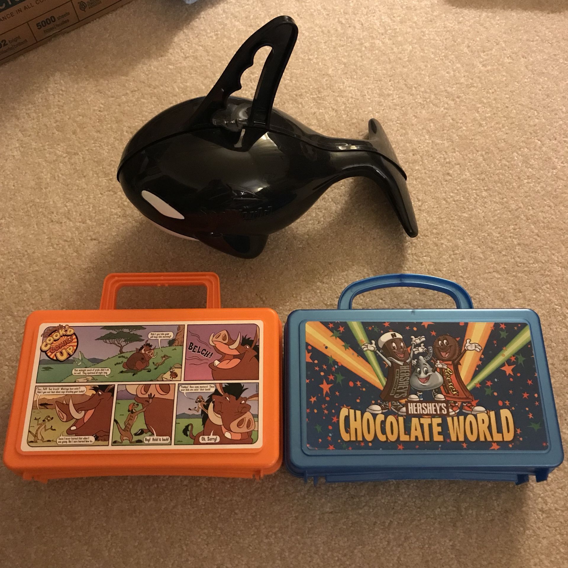 Collectible lunch boxes from hershey chocolate world, disney world, and sea world