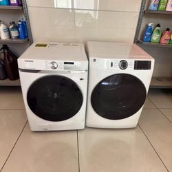 White front load washer and dryer