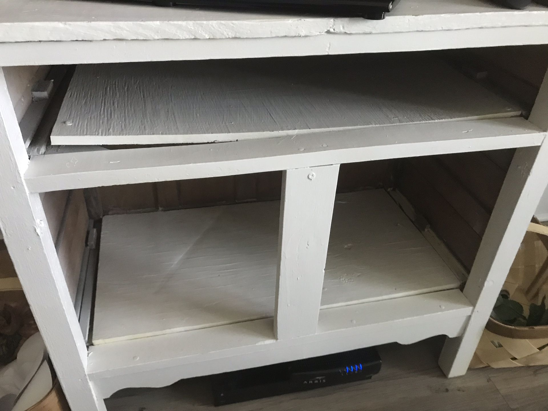 Tv stand, small dresser that you can use if you put baskets inside of it.