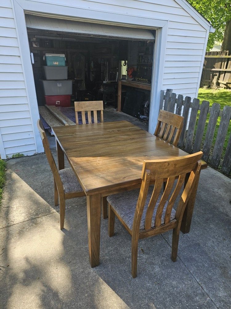 Dining Table And Four Chairs