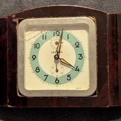 Vintage Isomax Made in Germany windup clock. Seems to run. Very cool 8.5 inch by 5 inch mid-century modern art deco glow in the dark