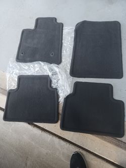 2024 Chevy Colorado crew cab genuine black carpeted floormats.