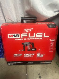 Milwaukee M18 rotary hammer and batteries