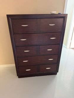 Dark Wood Tall Dresser with Silver Handles