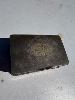 vintage keepsake cigarette case jewelry box featuring hallmark stamps on the base.