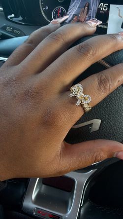 Rolex Bow Ring.