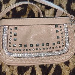 Beige/light brown cross body bag.