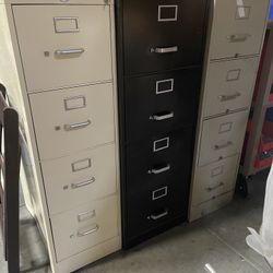 4 Drawer Metal File Cabinet – Commercial Grade – Used  Description: • 4 drawer vertical file cabinet • Heavy-duty metal construction • Commercial grad