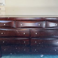 Brown Wood Nine Drawer Dresser