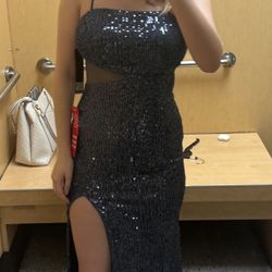 Small Prom Dress (I believe!). Slit in front, very flattering, is a blue/grey color. 