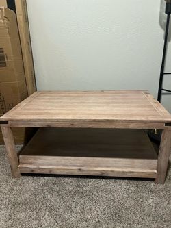 Coffee table and end table set from living spaces