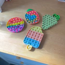 4 Pop Its Perfect Condition Medium Size 