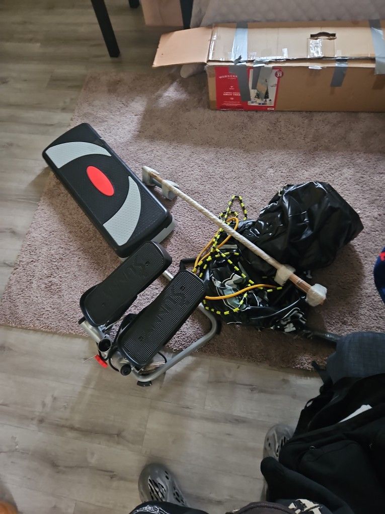 Punching Bag,2 Work Out Machines, And A Bar