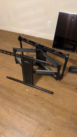 Two TV mounts and a 42” Vizio TV