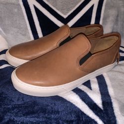 Coach slip-ons