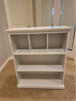 White wood bookshelf