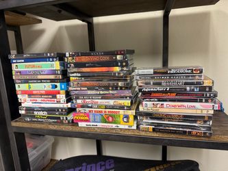 Lot of DVDs - 27 sealed and 15 used