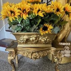 Beautiful small console with the plant sunflower for two pieces