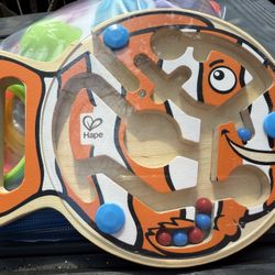 Hape Go-Fish-Go Maze Puzzle Magnetic Wooden Bead Happy Clown Fish Educational Travel Toy Game for Toddlers and Kids, Orange and White