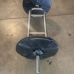 Trycep bar and 50 pounds on plates