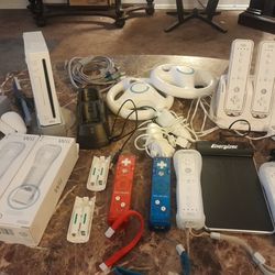NINTENDO WII AND ACCESSORIES LOT