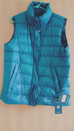 Eddie Bauer Down Vest Brand new with tags Women's tall large down vest. See our other great art antiques jewelry Sports outdoors fishing furniture VHS