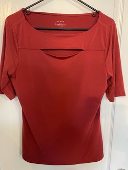 Pretty rust colored blouse with cut out top on boatneck