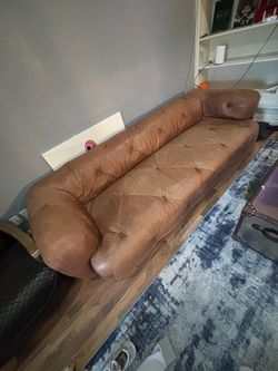 Timothy Oultton leather couch