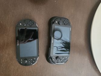 2 psvitas and a case