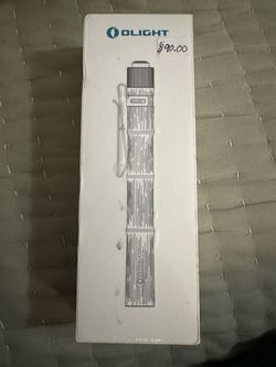 Olight Flashlight in Box