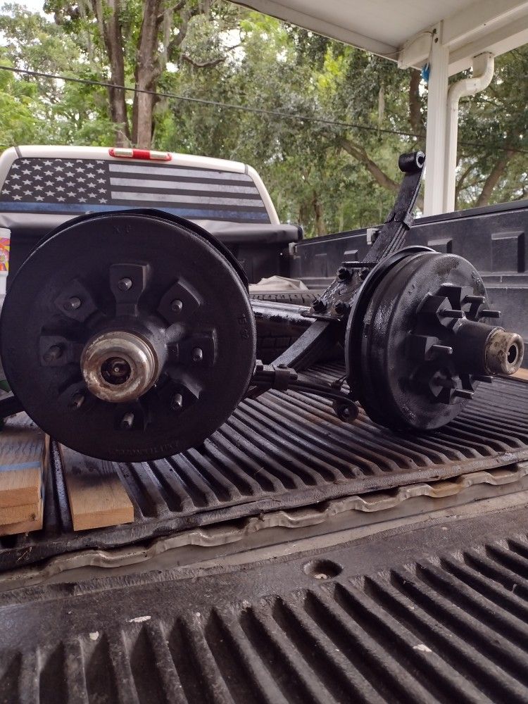 2- 7,000 Lb Matching LCI Lippert Axles