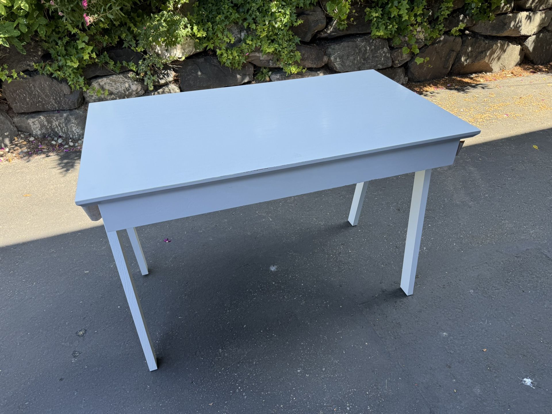 White desk with blue drawer