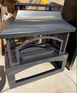 New Firepit bronze finish....does have small dent