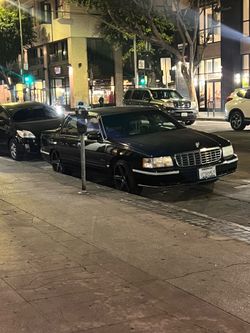 4500$ CADILLAC  DEVILLE AS IS MUST GO TITLE IN HAND
