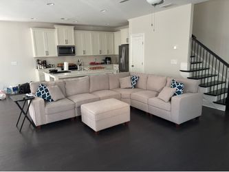 Sectional couch  with ottoman and pillows, like new