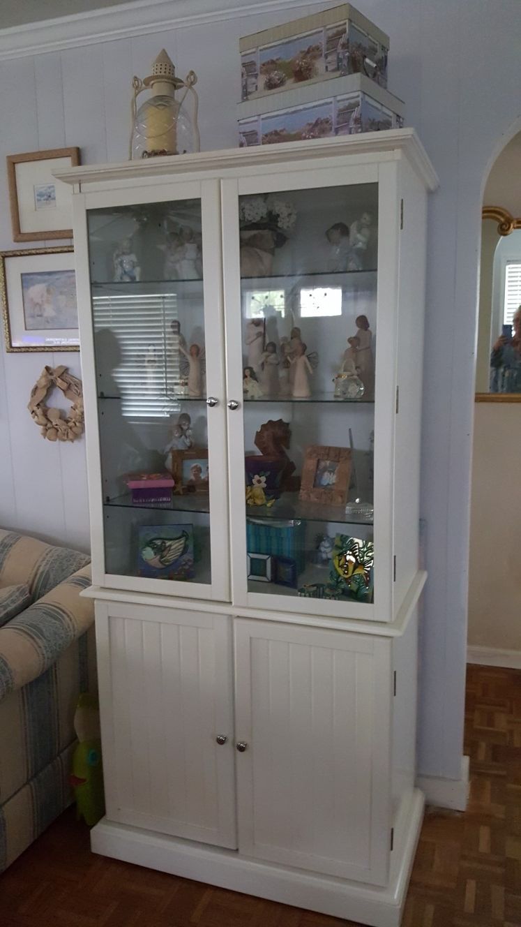 Beautiful cabinets we have 2 ..Glass shelving ..great storage
