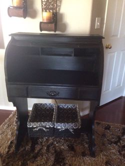 Black antique desk with chair and baskets