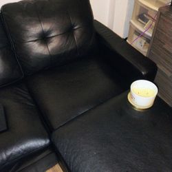 Nice Black Couch And OttomN