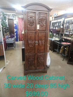 Antique Carved Wood Armoire Cabinet We are located at 2811 East Bell road. Another Time Around Furniture.