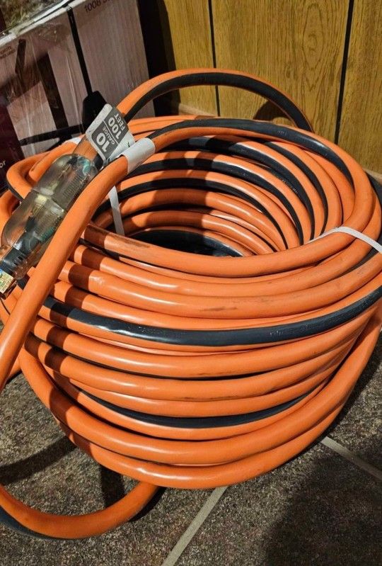 RIDGID

100 ft. 10/3 Heavy Duty Indoor/Outdoor SJTW Extension Cord with Lighted End, Orange/Grey