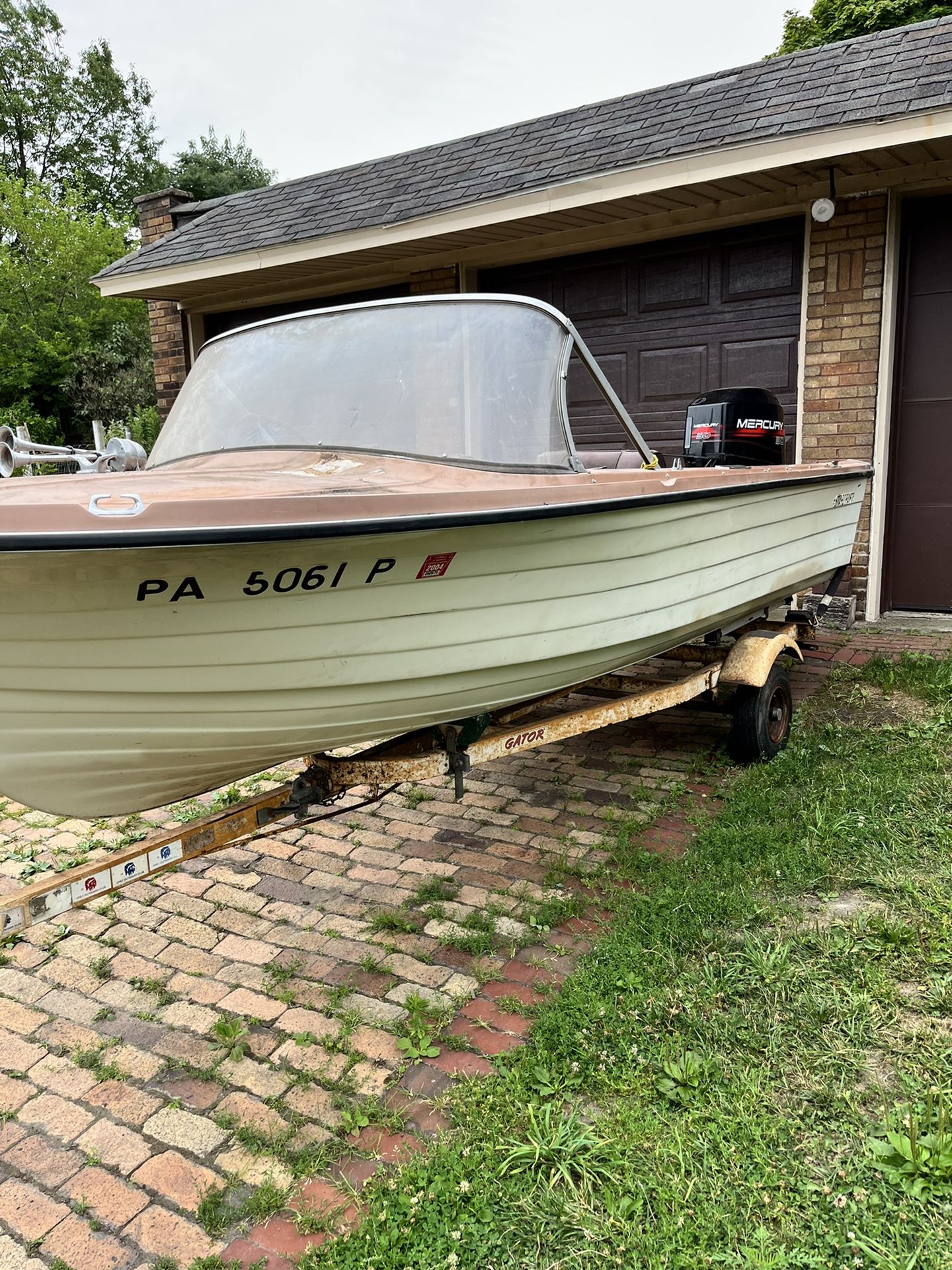 16 Starcraft Fiberglass Boat motor and trailer