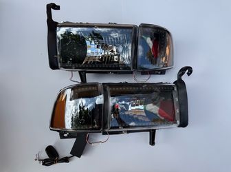 AS IS 94-01 Dodge Ram 1500, 94-02 2500 & 3500 Headlights; Black Housing With Amber Corners