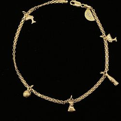 $650 Yellow Gold W Charms Bracelet 