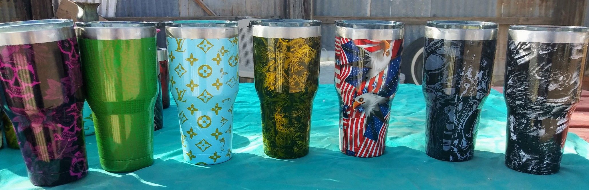 Cups for hot or cold item's Hydro dip painting on outside. Small one's hold a can for soda or beer other items can be painted as well.