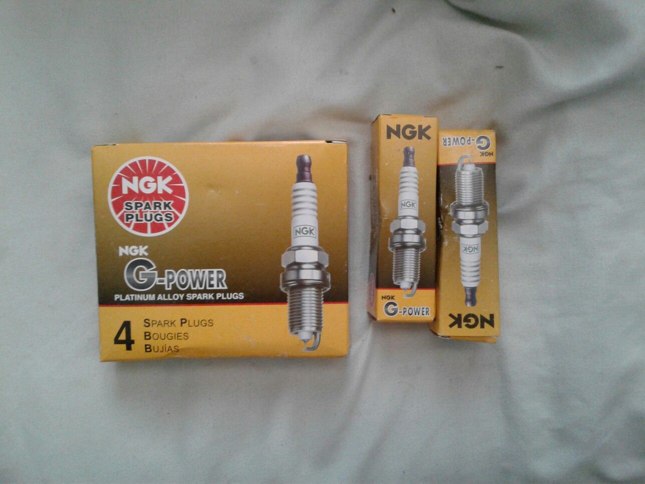 ngk g power spark plugs and coil on boot