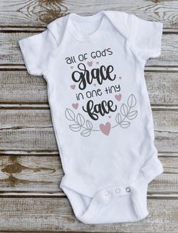 All of gods grace in one tiny face onesie
