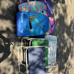 2 Beach Chairs, 4 Boogie Boards, And A Cooler