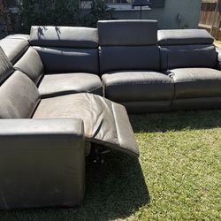 Free leather Sectional With Electric Recliner. .