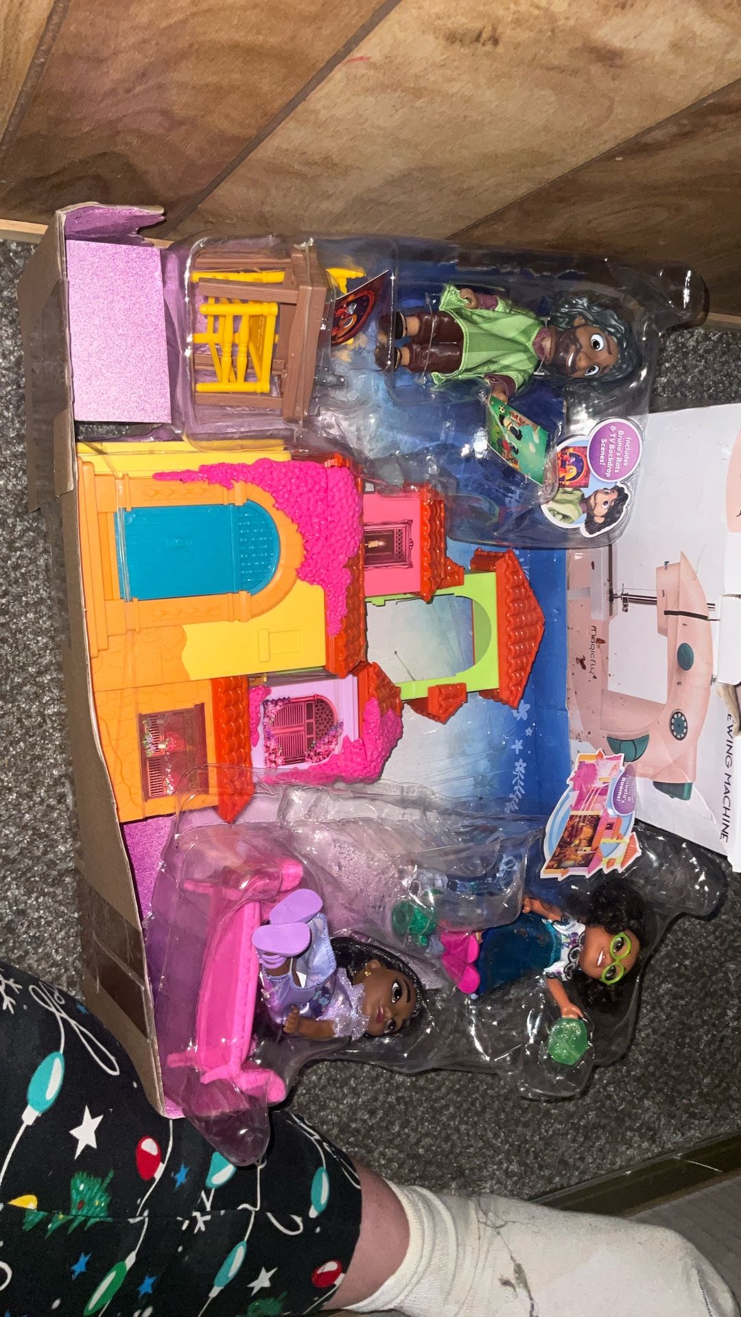 Brand new Encanto doll set with house and three dolls and all accessories box is open, but never taken apart brand new